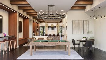 A room with a pool table and a bar area at The Stadler Luxury Apartments, Bradenton, 34210